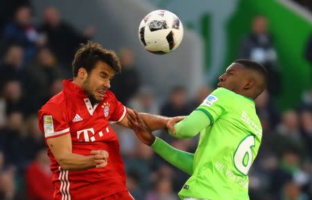 Football Soccer - VFL Wolfsburg v Bayern Munich - Bundesliga - Volkswagen Arena, Wolfsburg, Germany - 29/4/17 VfL Wolfsburg's Riechedly Bazoer in action with Bayern Munich's Juan Bernat Reuters / Kai Pfaffenbach Livepic