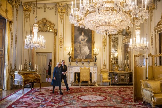 The Queen Consort arrives to present Mikhail Baryshnikov with his honour