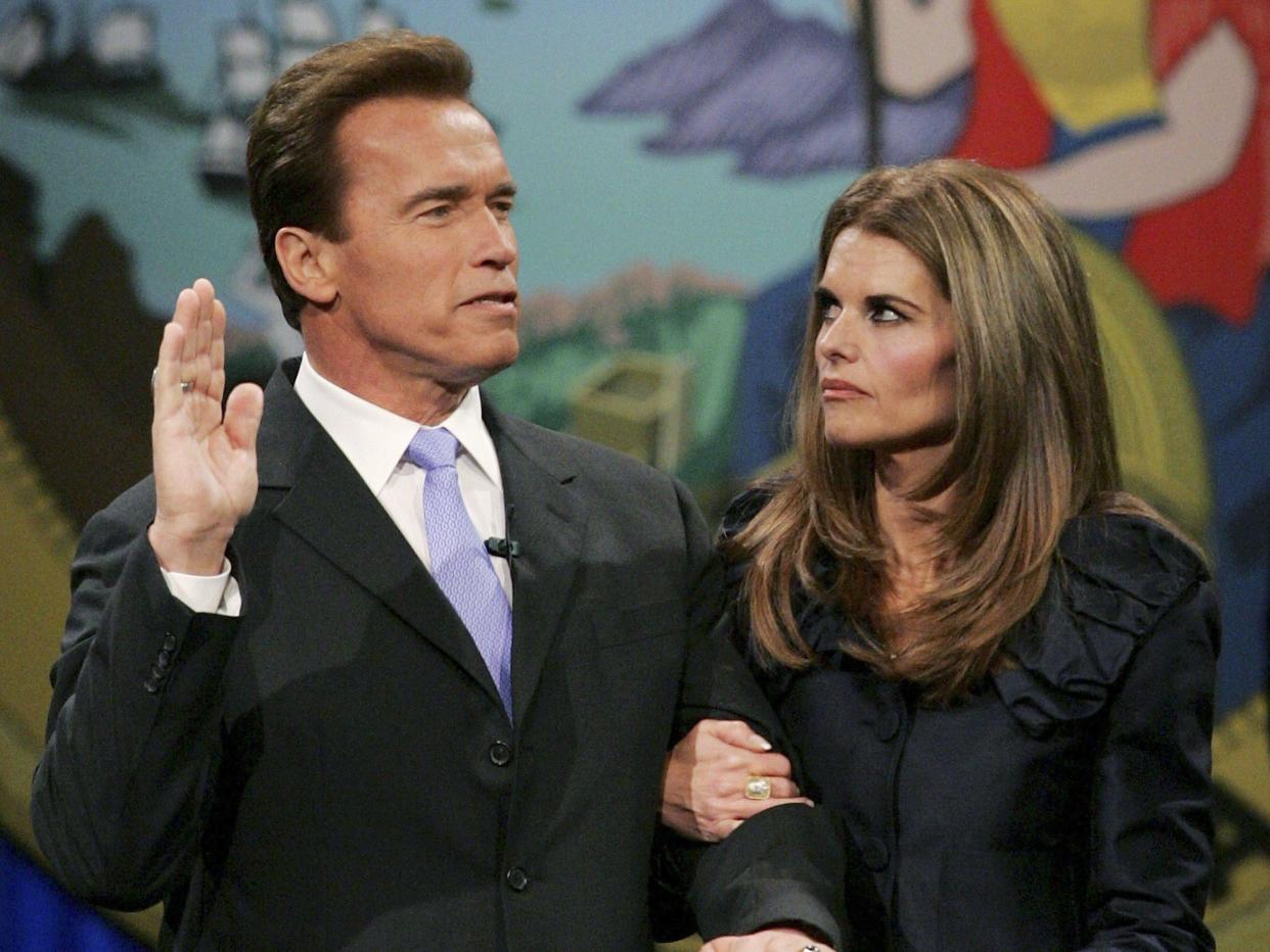 California governor Arnold Schwarzenegger is sworn in for second term as his wife Maria Shriver looks on January 5, 2007 in Sacramento, California.