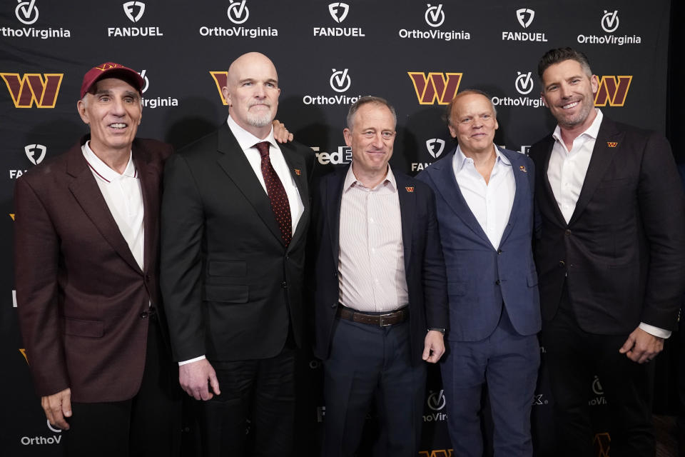 (L-R) Limited partner Mitch Rales of the Washington Commanders, head coach Dan Quinn, managing partner <a class="link " href="https://sports.yahoo.com/nfl/players/26168/" data-i13n="sec:content-canvas;subsec:anchor_text;elm:context_link" data-ylk="slk:Josh Harris;sec:content-canvas;subsec:anchor_text;elm:context_link;itc:0">Josh Harris</a>, limited partner Mark Ein, and general manager Adam Peters. (Photo by Jess Rapfogel/Getty Images)