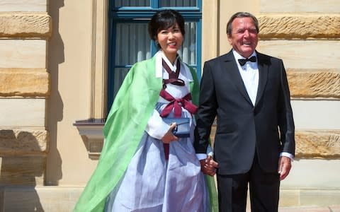 Bayreuth Festival 2019 with Angela Merkel, Gerhard SchÃ¶der Pictured: Ex-Chancellor Gerhard Schroeder with wife Soyeon Kim  - Credit: People Picture / SplashNews.com