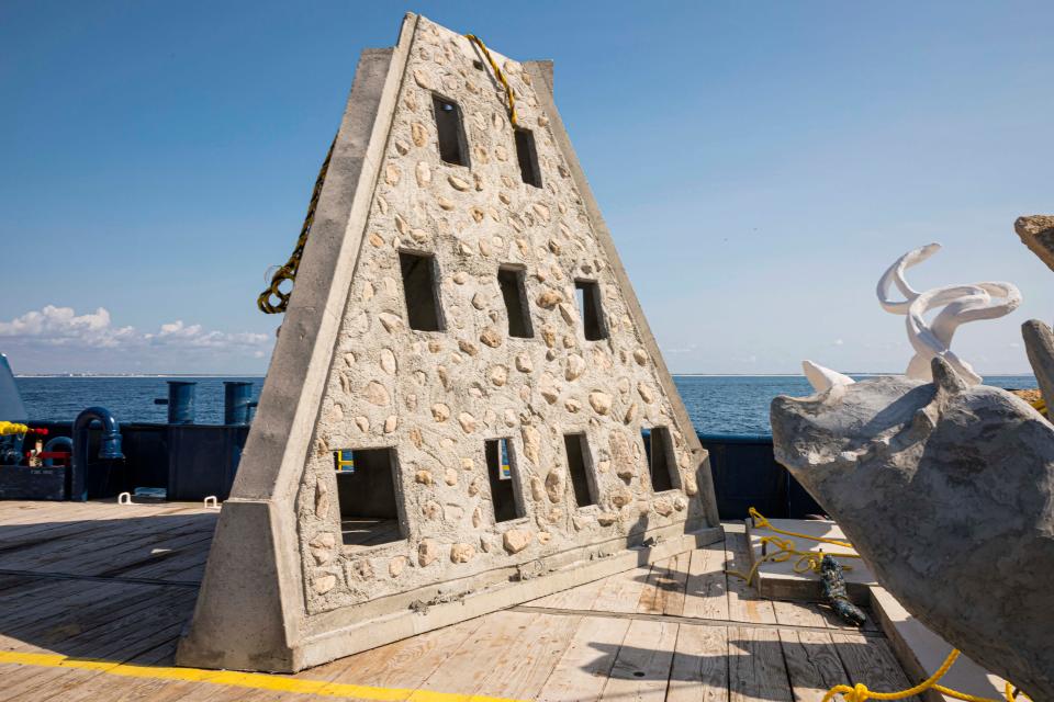 An artificial reef structure sits on a barge waiting to be deployed in the Gulf of Mexico about 5.75 nautical miles southwest of Destin.