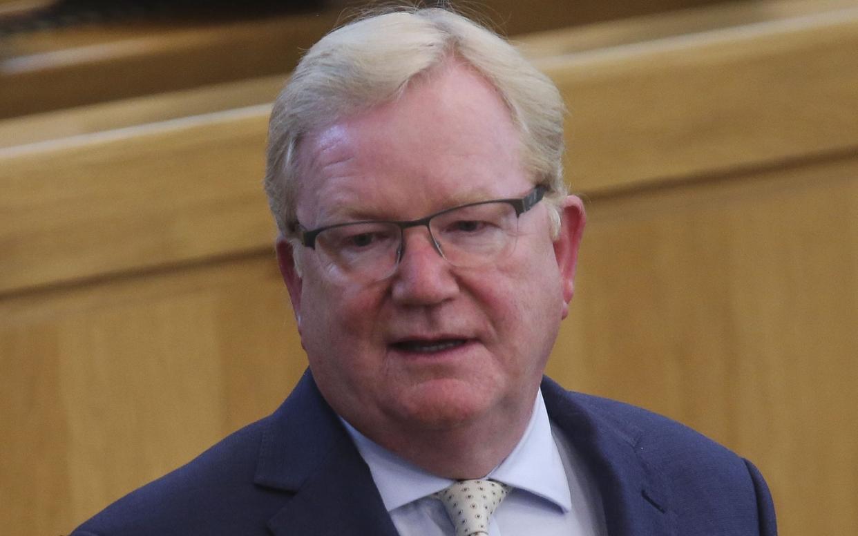 MP Jackson Carlow speaking at the Scottish Parliament