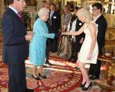 <p>We'd like to think that Prince Harry’s grandma set him up with Ellie Goulding after this meeting at Buckingham Palace. After all, it happened the same year the two were <a href="https://www.cosmopolitan.com/entertainment/celebs/g13938217/prince-harry-dating-history/" rel="nofollow noopener" target="_blank" data-ylk="slk:reportedly linked;elm:context_link;itc:0;sec:content-canvas" class="link ">reportedly linked</a>.</p>