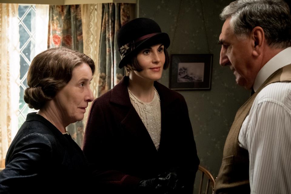 Lady Mary (Michelle Dockery, center) readies for a royal visit alongside Mrs. Hughes (Phyllis Logan) and Mr. Carson (Jim Carter) in 