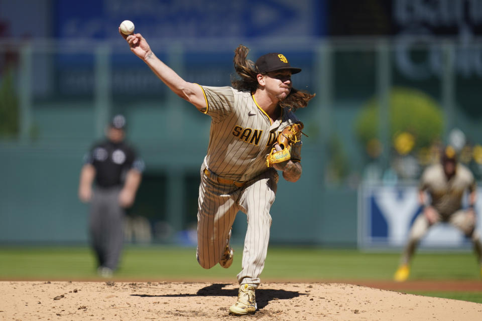 San Diego Padres starting pitcher Mike Clevinger delivers a pitch to Colorado Rockies' Yonathan Daza in the first inning of a baseball game Sunday, Sept. 25, 2022, in Denver. (AP Photo/Geneva Heffernan)