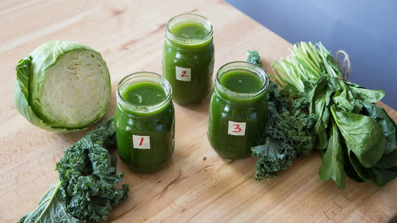 juice and vegetables on table 