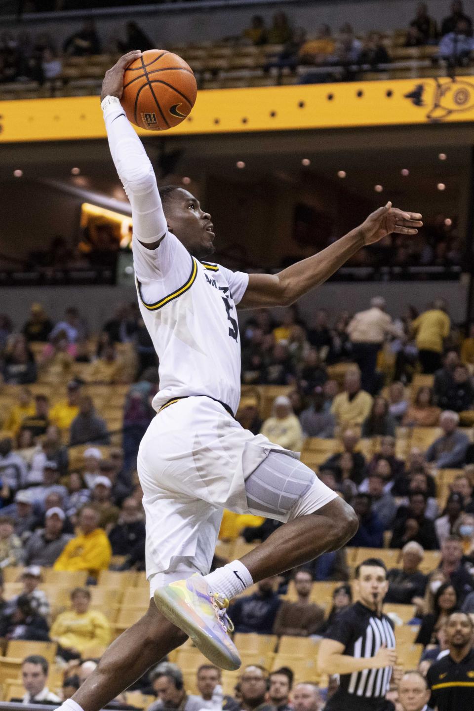 Missouri's D'Moi Hodge dunks the ball during the second half of an NCAA college basketball game against Coastal Carolina Wednesday, Nov. 23, 2022, in Columbia, Mo. Missouri won 89-51.(AP Photo/L.G. Patterson)