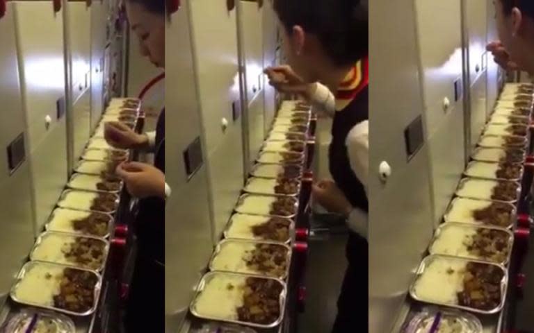 Flight attendant suspended after filming herself eating leftover in-flight meal