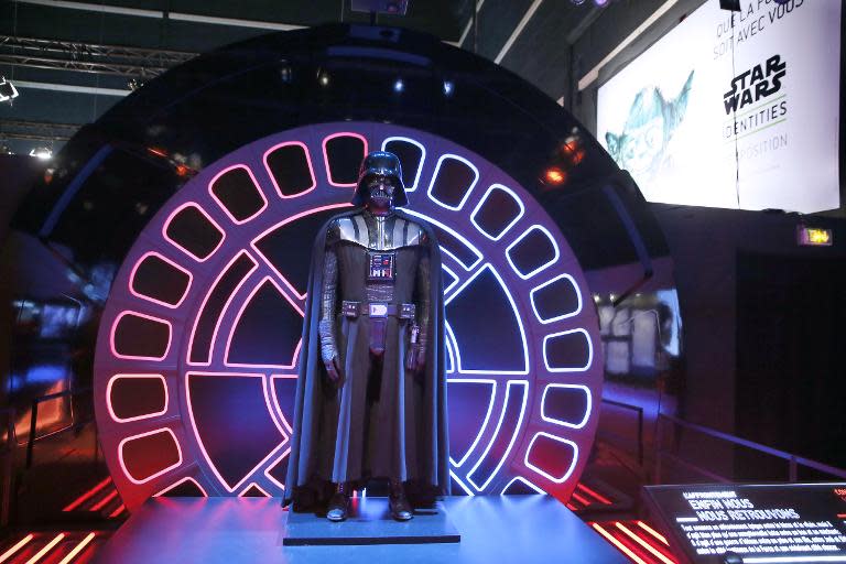 A costume of character Darth Vader from the Star Wars film series is displayed at the exhibition "Star Wars Identities" at the Cite du Cinema in Saint-Denis, outside Paris, on February 13, 2014