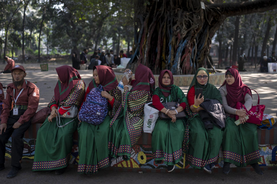 Election workers wait at a distribution centre to be deputed to various polling stations in Dhaka, Bangladesh,Saturday, Jan. 6, 2024. Bangladesh’s main opposition party has enforced a 48-hour general strike from Saturday across the South Asian nation as the nation is ready to hold its next general election a day later. (AP Photo/Altaf Qadri)