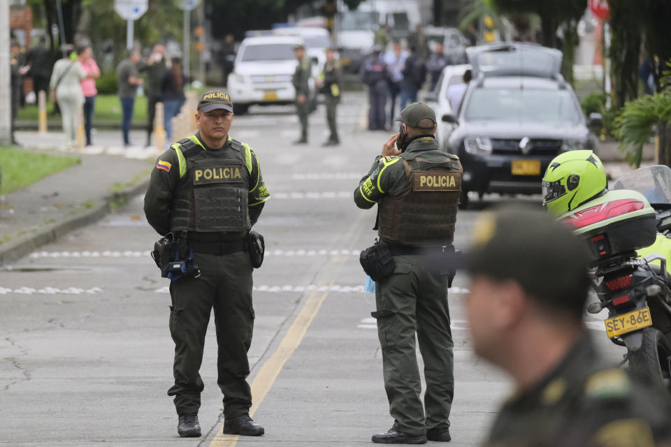 Police block access to a jail that was the site of a deadly fire in Tulua, Colombia, Tuesday, June 28, 2022. (AP Photo/Juan Jose Horta)