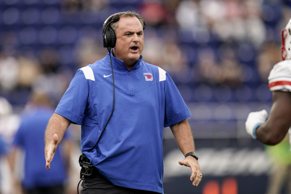 SMU head coach Sonny Dykes reacts after a touchdown against Navy during the first half of an NCAA college football game, Saturday, Oct. 9, 2021, in Annapolis, Md. (AP Photo/Julio Cortez)