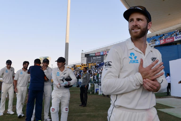 New Zealand captain Kane Williamson leads his team back to the pavilion after they completed their first away series win against Pakistan in 49 years