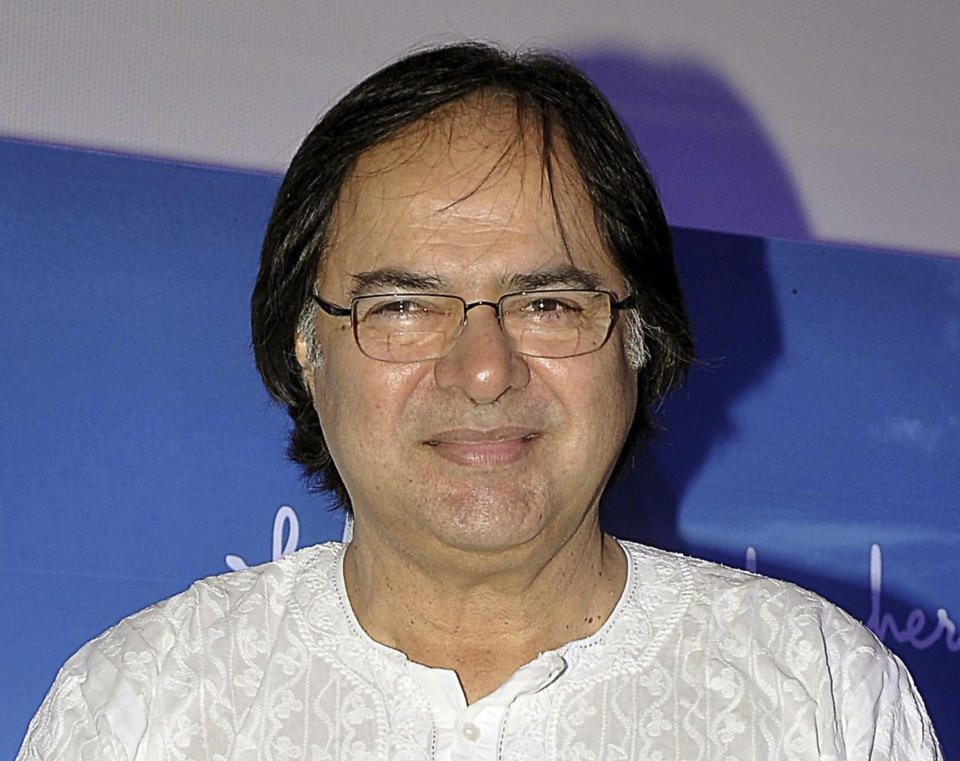 In this Nov. 30, 2013 photo, Indian actor Farooq Shaikh attends a promotional event for his film Club 60 in Mumbai, India. Shaikh, the plump unlikely hero of scores of Bollywood films, has died. He was 65. Press Trust of India reported that Shaikh suffered a heart attack Friday in Dubai, where he was visiting with his family. (AP Photo/Sunil Khandare)