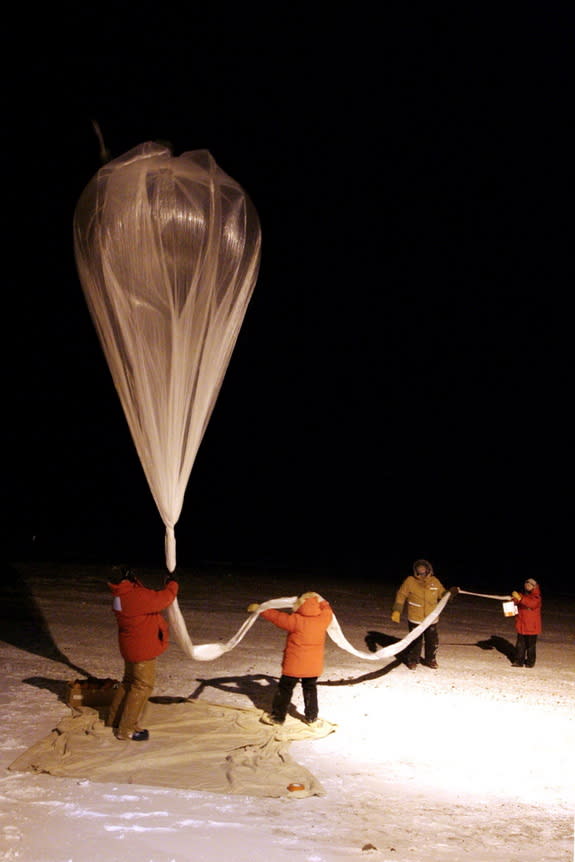 MDRS Crew 133 commander Paula Crock, at right, spent several months at McMurdo Station in Antarctica. Here, her crew launches a zero-pressure balloon to study ozone in the area.