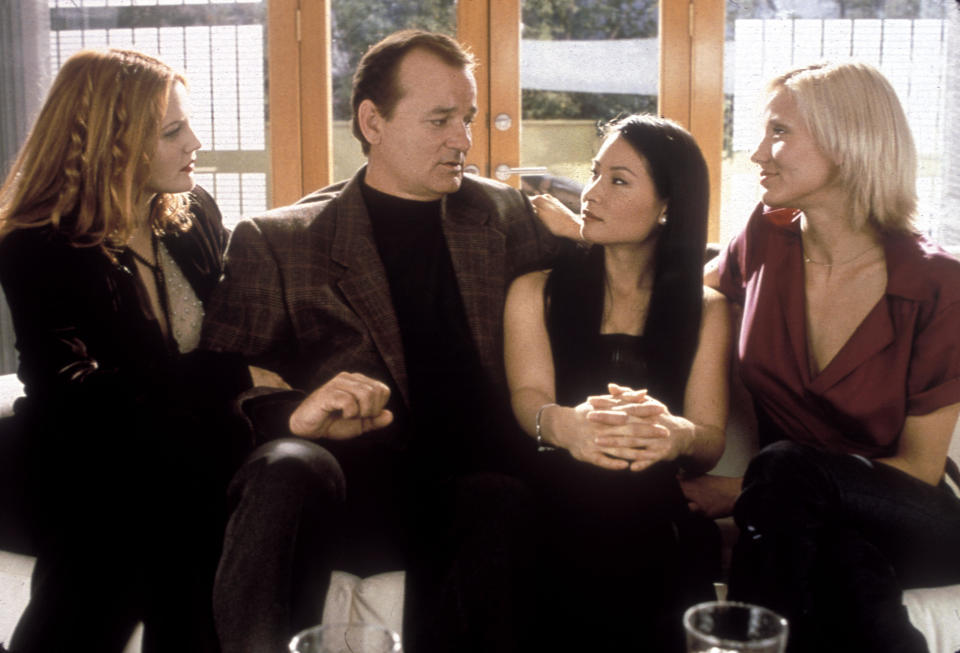 Bill Murray sits with Drew Barrymore, Lucy Liu and Cameron Diaz in a scene from Charlie's Angels