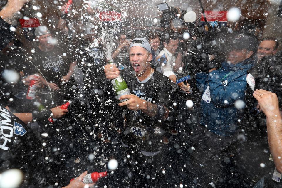 Oct 7, 2019; Minneapolis, MN, USA; The New York Yankees celebrate their victory in the locker room after defeating the Minnesota Twins in game three of the 2019 ALDS playoff baseball series at Target Field. Mandatory Credit: Jesse Johnson-USA TODAY Sports