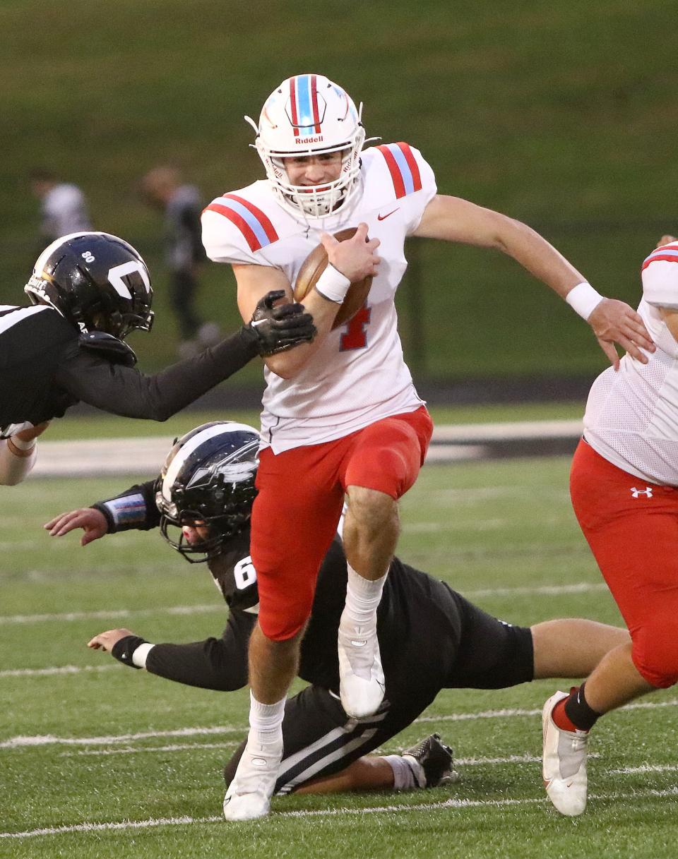 Alliance quarterback Brendan Zurbrugg during conference action at Carrollton High School Friday, September 30, 2022.