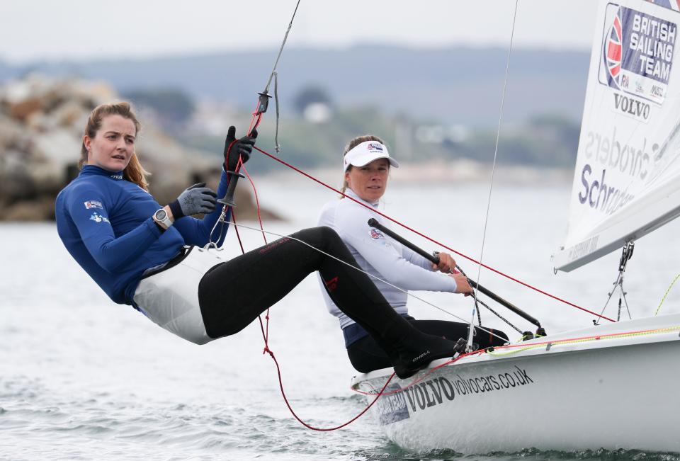 Great Britain’s Eilidh McIntyre and Hannah Mills, right, have secured a medal in the 470 class (PA) (PA Archive)