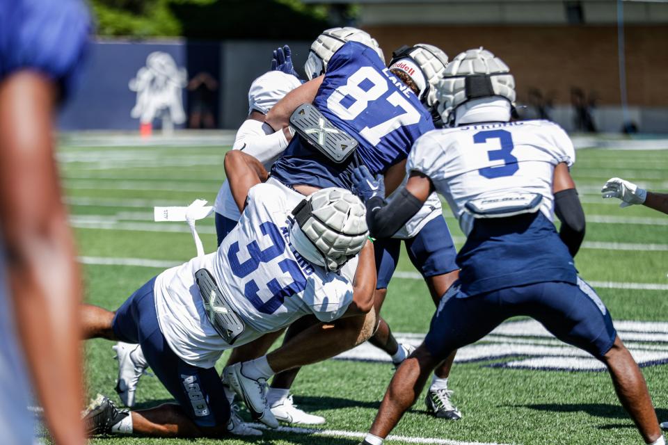 Utah State linebacker Max Alford makes a tackle during fall camp in Logan. | Utah State Athletics