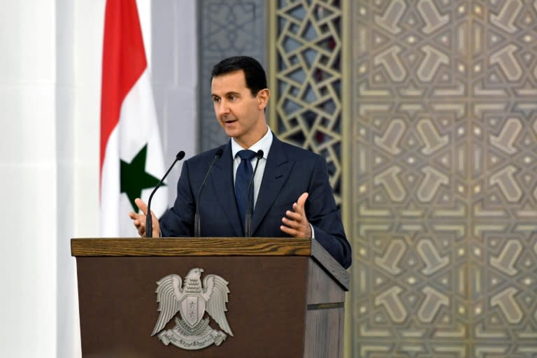 A handout picture released by the official Syrian Arab News Agency (SANA) on August 20, 2017 shows President Bashar al-Assad delivering a speech to members of Syria's diplomatic corps in Damascus