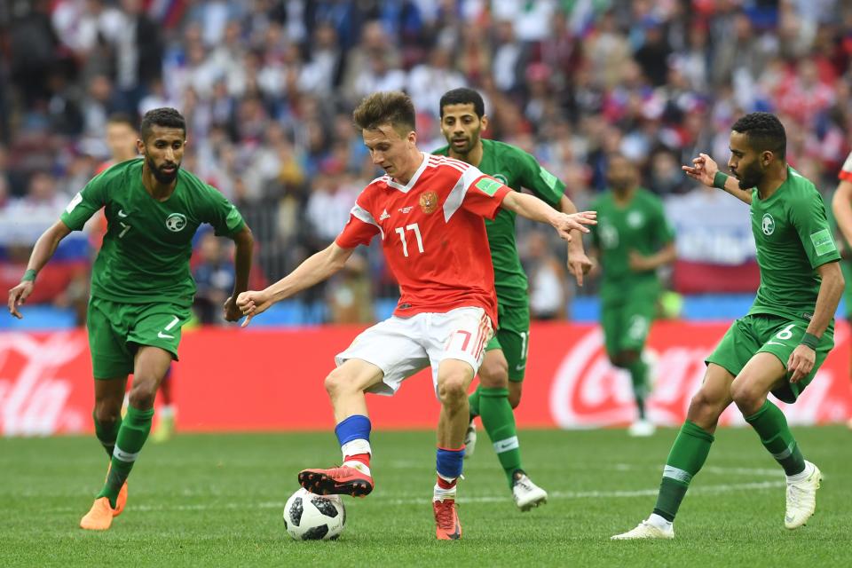 Russia’s midfielder Aleksandr Golovin (C) vies with (fromL) Saudi Arabia’s midfielder Salman Al-Faraj, Saudi Arabia’s midfielder Taisir Al-Jassim and Saudi Arabia’s defender Mohammed Al-Breik during the Russia 2018 World Cup Group A football match between Russia and Saudi Arabia at the Luzhniki Stadium in Moscow on June 14, 2018. (Getty Images)