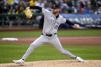 Colorado Rockies starting pitcher Austin Gomber delivers during the first inning of a baseball game against the Pittsburgh Pirates in Pittsburgh, Saturday, May 4, 2024. (AP Photo/Gene J. Puskar)