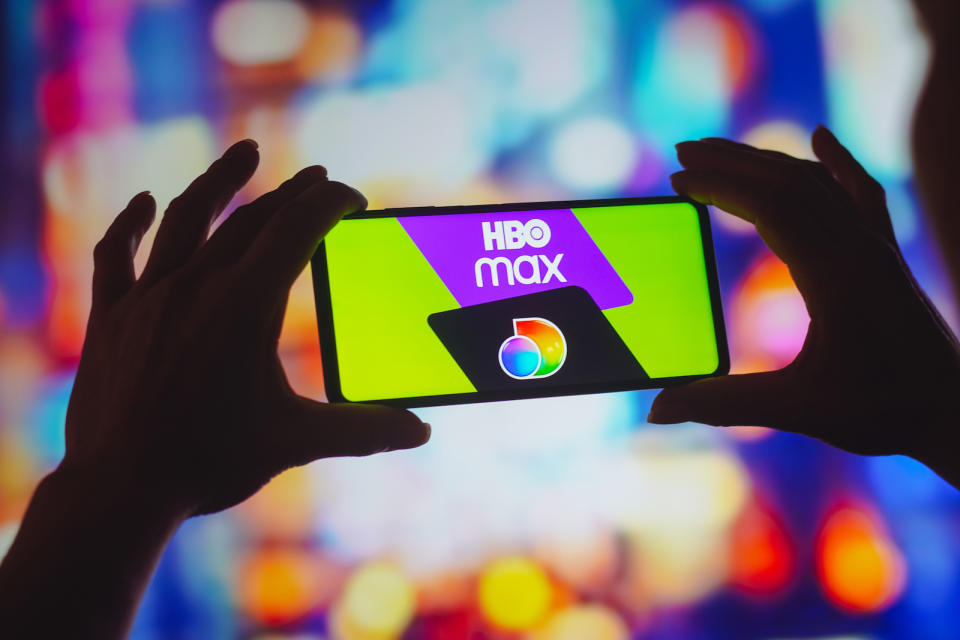 BRAZIL - 2022/08/05: In this photo illustration, the HBO Max and Discovery Plus logos is displayed on a smartphone screen. (Photo Illustration by Rafael Henrique/SOPA Images/LightRocket via Getty Images)