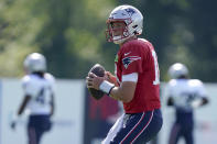 New England Patriots quarterback Mac Jones warms up during an NFL football joint practice with the Carolina Panthers, Tuesday, Aug. 16, 2022, in Foxborough, Mass. (AP Photo/Steven Senne)