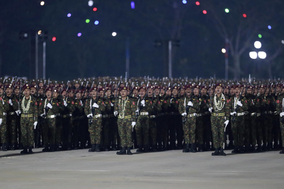 Military officers shout slogans during a parade to commemorate Myanmar's 79th Armed Forces Day, in Naypyitaw, Myanmar, Wednesday, March 27, 2024. (AP Photo/Thein Zaw)