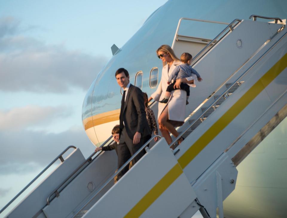 Ivanka Trump, daughter of US President Donald Trump, her husband Jared Kushner, senior adviser to Trump, and their children walk off Air Force One at Palm Beach International Airport in Florida: AFP/Getty Images