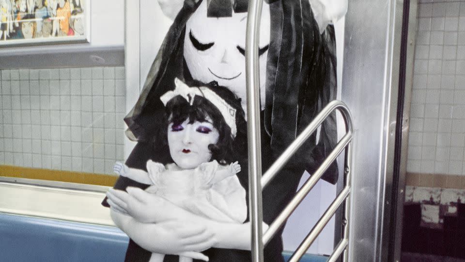 A ghostly double doll costume. - Seymour Licht