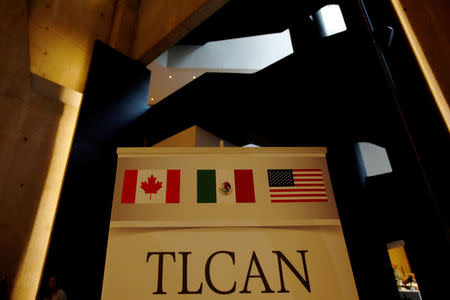 FILE PHOTO: A NAFTA banner is pictured where the second round of NAFTA talks involving the United States, Mexico and Canada is taking place in Mexico City, Mexico September 1, 2017. REUTERS/Carlos Jasso