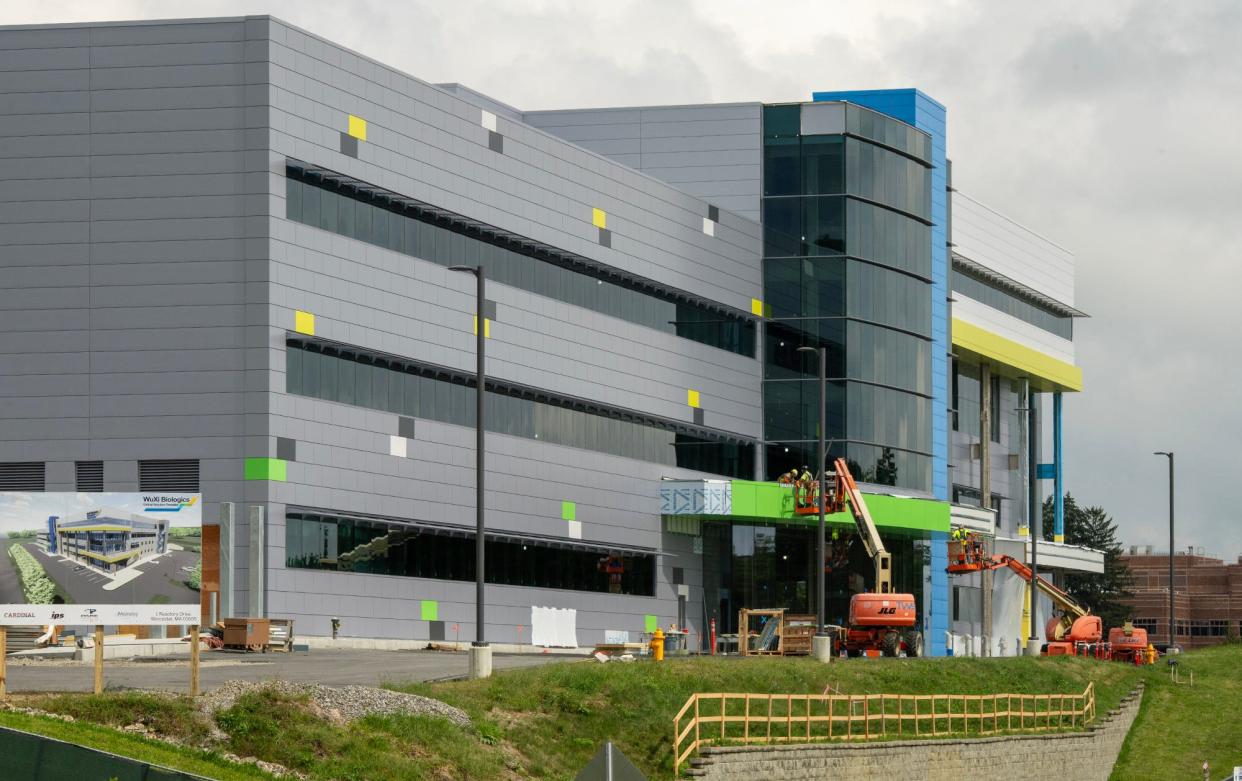 Construction continues on a 189,500-square-foot facility in Worcester by pharmaceutical manufacturing firm WuXi Biologics Monday.