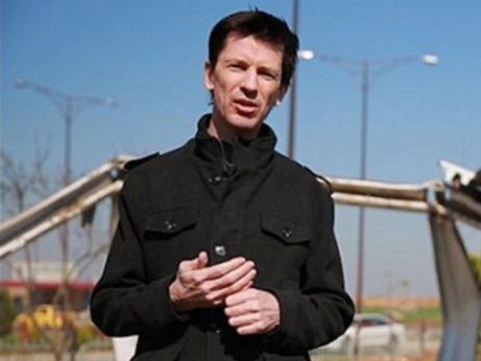 British hostage John Cantlie was shown in a series of Isis propaganda videos before disappearing during the battle of Mosul (AP)