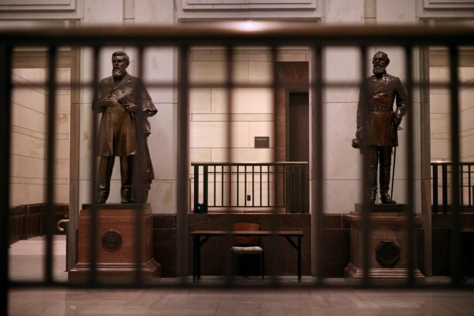 Statues of James Zachariah George (L), a colonel in the Confederate Army and U.S. Senator from Mississippi, and Edmund Kirby Smith, a native Floridian and a Confederal general, stand inside the U.S. Capitol Visitors Center June 18, 2020 in Washington, DC. (Photo by Chip Somodevilla/Getty Images)