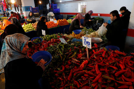 People shop at a food market in Istanbul, Turkey, February 11, 2019. REUTERS/Murad Sezer