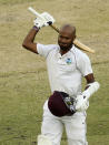 West Indies' Kraigg Brathwaite celebrates a century against Australia on the 4th day of their cricket test in Perth, Australia, Saturday, Dec. 3, 2022. (AP Photo/Gary Day)