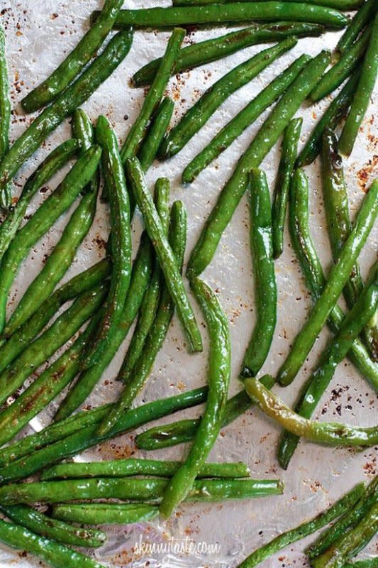 <p>Courtesy of skinnytaste.com</p><p>Only five ingredients and 20 minutes to make!</p><p><strong>Get the recipe: </strong><strong><a href="https://www.skinnytaste.com/roasted-parmesan-green-beans/" rel="nofollow noopener" target="_blank" data-ylk="slk:Roasted Green Beans with Parmesan;elm:context_link;itc:0;sec:content-canvas" class="link rapid-noclick-resp">Roasted Green Beans with Parmesan</a></strong></p>