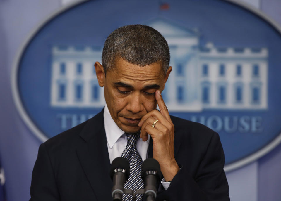 U.S. President Barack Obama speaks about the shooting at Sandy Hook Elementary School in Newtown, Connecticut, during a press briefing at the White House in Washington December 14, 2012. A heavily armed gunman opened fire on school children and staff at a Connecticut elementary school on Friday, killing 26 people including 18 children in the latest in a series of shooting rampages that have tormented the United States this year, U.S. media reported.     REUTERS/Larry Downing  (UNITED STATES - Tags: POLITICS CRIME LAW TPX IMAGES OF THE DAY)