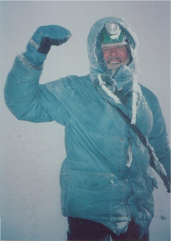 Robert Packard in a blizzard at the summit of Chimborazo, the highest point of Ecuador, in 1999. Chimborazo has the distinction of being the mountain whose summit is furthest from the center of the Earth.