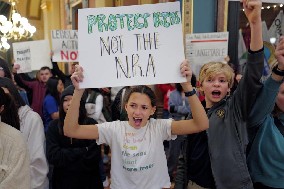 Students demonstrate for stricter gun control legislation as part of a March for Our Lives rally at the Iowa State Capitol on Jan. 8, 2024, in Des Moines. <a href="https://www.gettyimages.com/detail/news-photo/students-demonstrate-for-stricter-gun-control-legislation-news-photo/1917940354?adppopup=true" rel="nofollow noopener" target="_blank" data-ylk="slk:Scott Olson/Getty Images;elm:context_link;itc:0;sec:content-canvas" class="link ">Scott Olson/Getty Images</a>