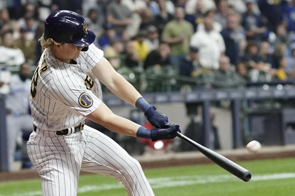 Milwaukee Brewers' Joey Wiemer hits na walk off RBI sacrifice fly during the ninth inning of a baseball game against the Kansas City Royals Saturday, May 13, 2023, in Milwaukee. The Brewers won 4-3. (AP Photo/Morry Gash)