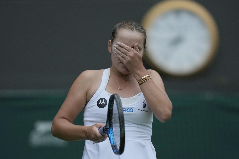 Sofia Kenin of the US celebrates defeating Coco Gauff of the US in the first round women's singles match on day one of the Wimbledon tennis championships in London, Monday, July 3, 2023. (AP Photo/Alastair Grant)