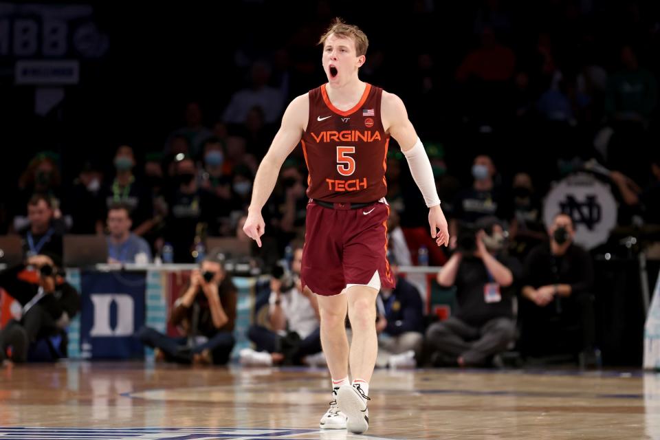 Mar 10, 2022; Brooklyn, NY, USA; Virginia Tech Hokies guard Storm Murphy (5) reacts after a three point shot against the Notre Dame Fighting Irish during the second half at Barclays Center.