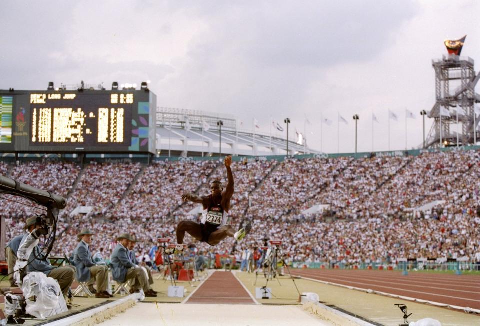 29 Jul 1996:  Carl Lewis of USA in action during the men''s long jump competition at Olympic Stadium during the 1996 Centennial Olympics in Atlanta, Georgia.  Lewis went on to win the gold medal. Mandatory Credit: Mike Powell  /Allsport