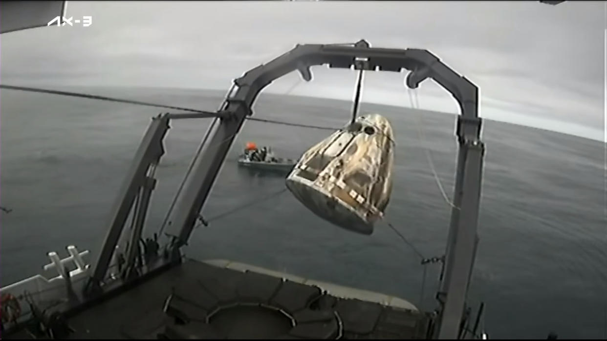  A SpaceX Dragon capsule carrying the Ax-3 astronauts is recovered from the Atlantic Ocean after splashdown on Feb. 9, 2024. 