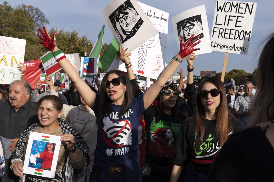 Demonstrators rally at the National Mall to protest against the Iranian regime, in Washington, Saturday, Oct. 22, 2022, following the death of Mahsa Amini in the custody of the Islamic republic's notorious "morality police." (AP Photo/Jose Luis Magana)