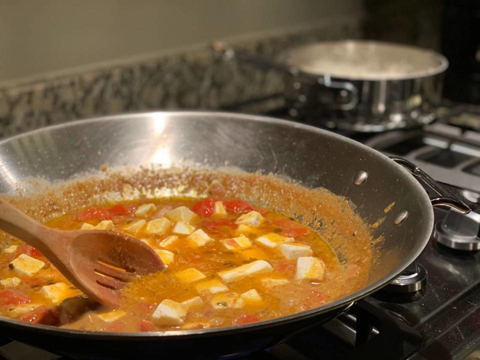 Chef Santhoshi Radhakrishnan creates meal kits that contain precisely measured ingredients and a tested recipe sheet. Shown above is paneer butter masala.